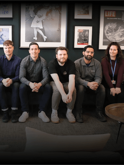 NVOY Team sitting in a row