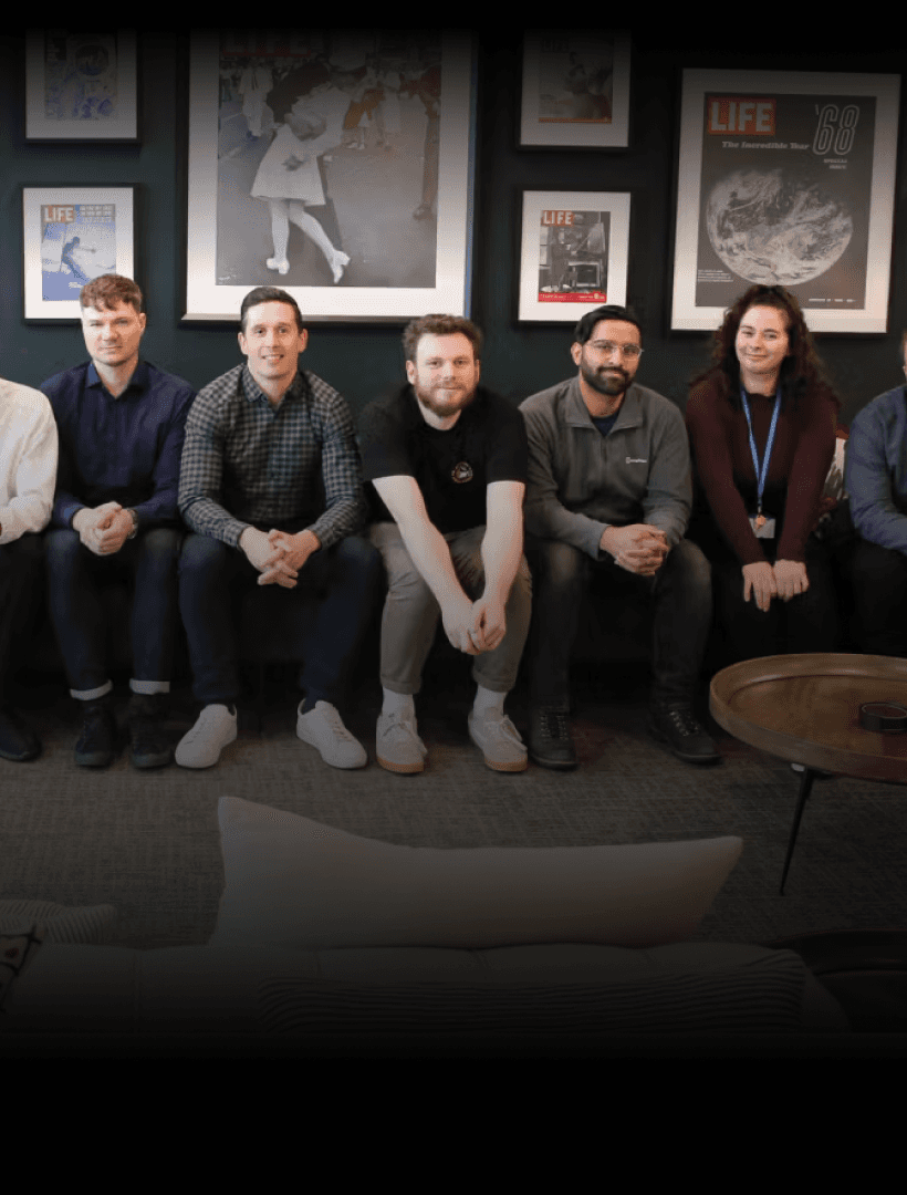 NVOY Team sitting in a row