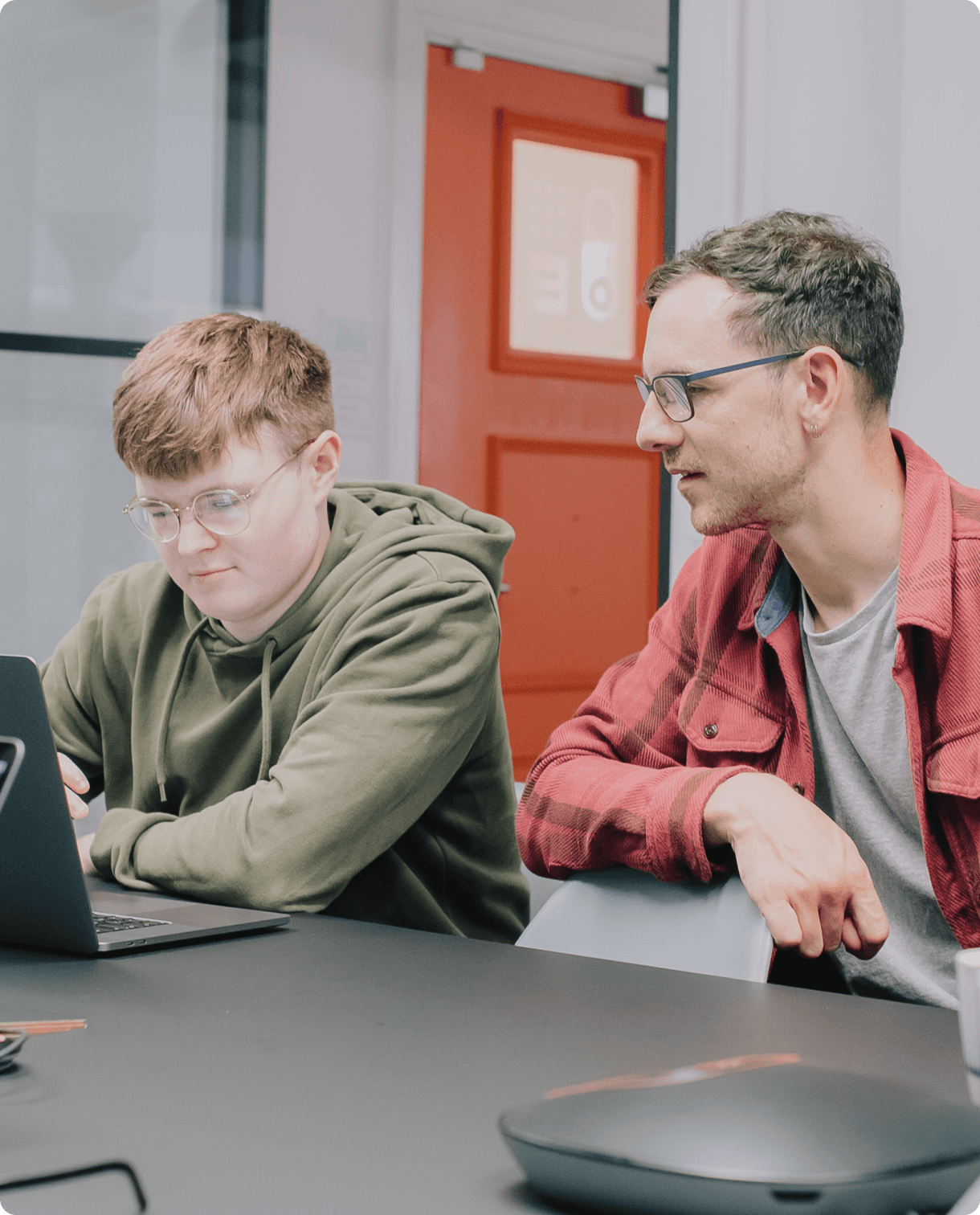 Capsule developers working together on a laptop