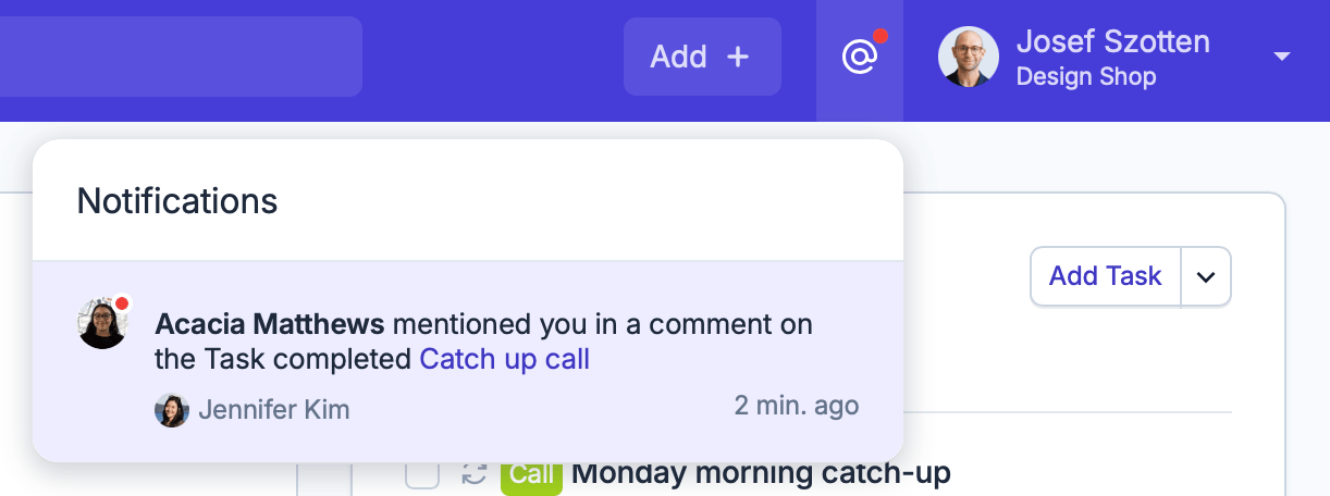 A notification for an @-mention comment showing in the notification tray.