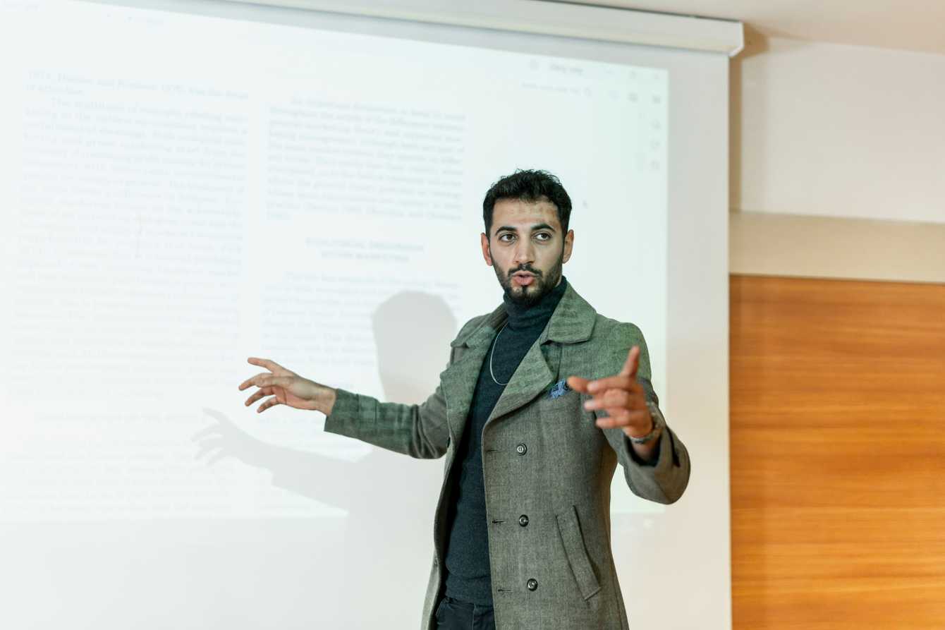 a teacher giving a lecture